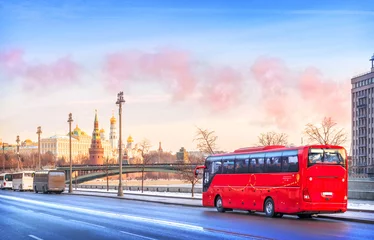 Foto op Canvas Red bus "Unforgettable Moscow" on the Prechistenskaya embankment of the Moscow River, Moscow Kremlin, Moscow © yulenochekk