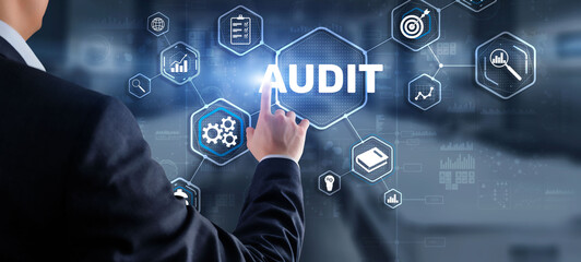 Audit. Checking the financial statements of the company. Businessman touching Audit on 3d virtual screen