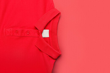Red shirt on color background