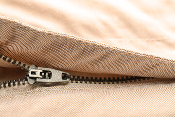 Closeup view of metal zipper on clothes