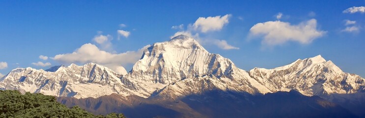 Panoramic view of snowcapped Mt. Dhaulagiri, the seventh highest mountain in the world, located in the Nepal Himalayas.