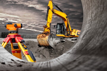 Modern level for geodesy at a construction site. Surveyors ensure precise measurements before...