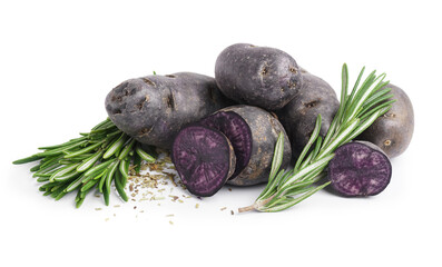 Heap of raw purple potatoes and herbs on white background