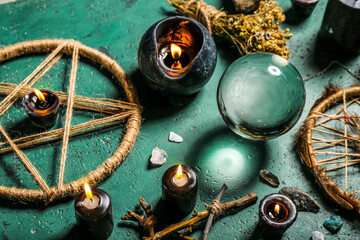 Magic attributes of fortune teller on green table