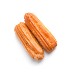 Delicious sweet eclairs isolated on white background