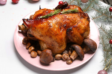 Plate with tasty chicken and mushrooms on white background, closeup