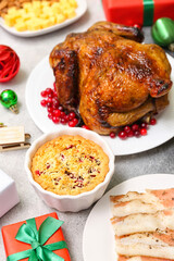 Different tasty dishes for Christmas dinner on table