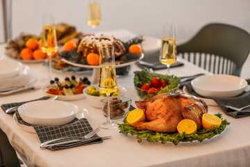 Different tasty dishes for Christmas dinner on table