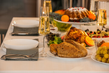 Different tasty dishes for Christmas dinner on table