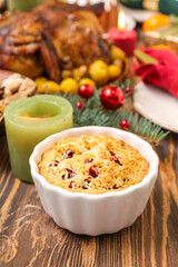 Christmas table setting with tasty pie on wooden background, closeup