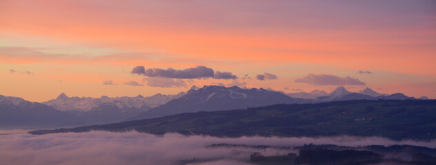 Breathtaking panorama of central Swiss alps with mount Pilatus, Eiger and Jungfrau, early morning...