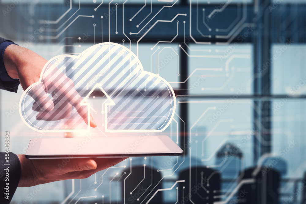 Poster close up of businessman hand pointing at tablet or smartphone with glowing cloud hologram on blurry 