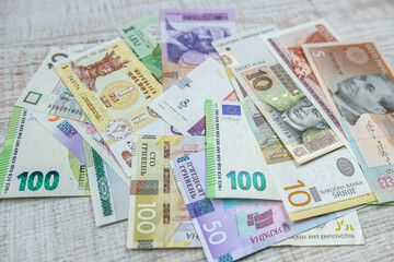 different european international money banknotes as background.