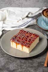 Trilece cake slice on dark background. Milk and caramel cake. Bakery products. Mexican sweets....