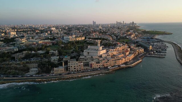 Aerial video forward to the old city of Jaffa during sunset