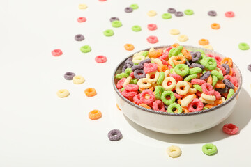 Concept of breakfast food, colorful corn flakes, close up