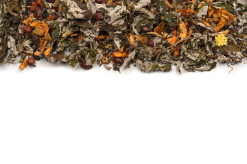 Dry tea leaves and dry fruit isolated on white background.