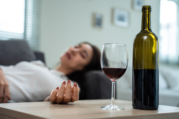 Asian young depression woman feeling heart broken and drinking alcohol. 