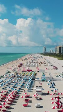 Miami South Beach Florida. colorful tropical beach with colorful chairs and umbrellas and a lifeguard hut on a sunny day