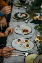 Appetizers are served on a decorated table during a festive event.