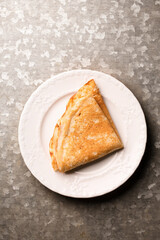 Fried thin pancake in a plate