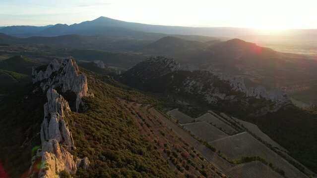 Aerial view of les Dentelles de Montmirail in front of the Mont Ventoux in the french alps