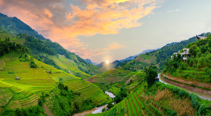 Vietnamese rice fields are seasonal because they are planted on verdant mountains and sunset sky