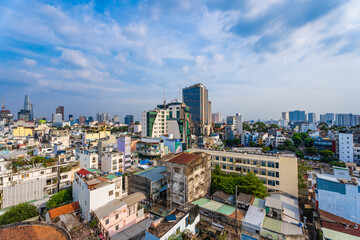 Fototapeta na wymiar Ho Chi Minh City, Vietnam - December 20, 2022: Beautiful afternoon in District 1, Ho Chi Minh City, known as Saigon, a developed city of Vietnam with many skyscrapers. View to Bitexco, Landmark 81.