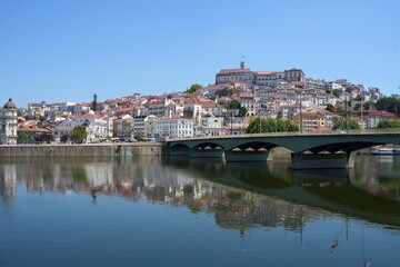 Fototapeta na wymiar View to Santa Clara bridge over Mondego river in Coimbra, Portugal