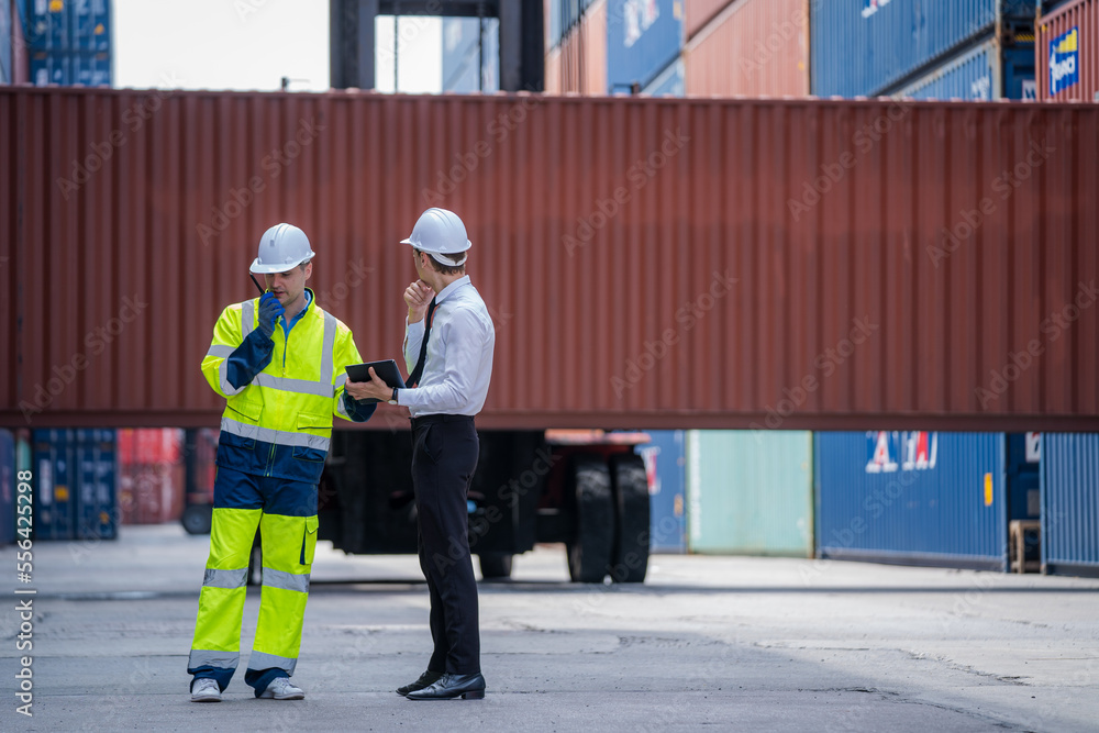 Poster Engineer container cargo with worker working and checking stock into container for loading,logistic and business export.