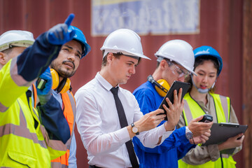 Engineer team planning the transportation of goods for import Or export in the container...