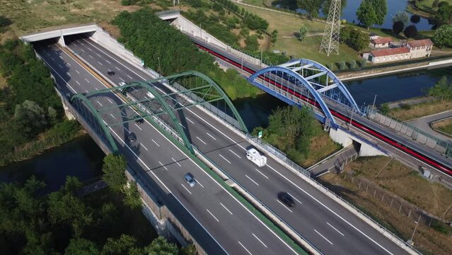 Aerial view of the highway and high speed rail, Bernate, near Milan, Italy