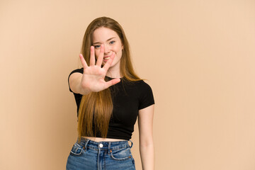 Young redhead woman cut out isolated smiling cheerful showing number five with fingers.