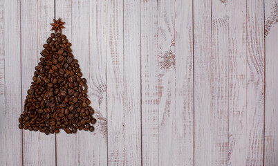 Coffee beans xmas tree on a white background. Copy space