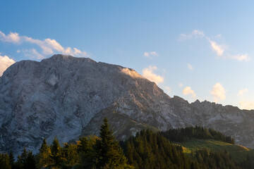 Austrian alps background in summer, popular travel destination, background summer sunset sunrise. Mountains' natural background, tourist destination