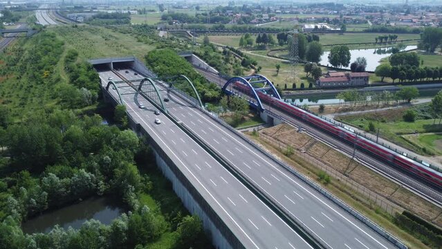 Aerial view of the highway and high speed rail, Bernate, near Milan, Italy