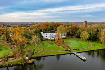 Photos of a picturesque autumn park on the lake in Lower Saxony, Germany. Dawn in the park.