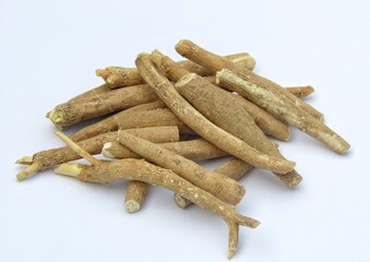 Withania somnifera or ashwagandha roots isolated on white background 