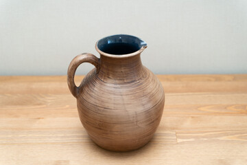 Ceramics, a ceramic product made with their own hands on a potter's wheel, a mug.