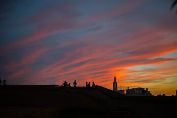Naklejka premium sunset over the city