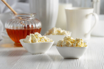 Fresh homemade cottage cheese with honey.