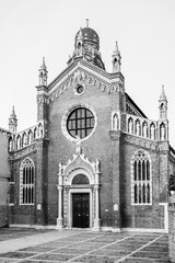 Facade of the gothic medieval church of Madonna dell'Orto; church of Madonna of the Garden; church of the Lady of the Garden in Venice, Italy in black and white