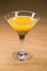 Alcoholic cocktail with passion fruit