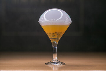 Alcoholic cocktail with passion fruit