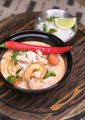 Restaurant dish - mushroom cream soup with seafood
