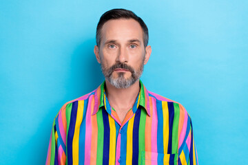 Portrait photo of mature serious face man grey beard wear striped colorful nice hairstyle want get new job vacancy isolated on cyan color background