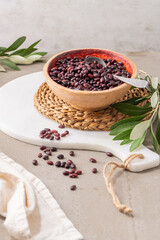 Red dry raw beans in a bowl on a kitchen countertop. Cooking Healthy Food