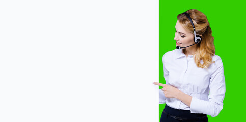 Call Center Service concept - customer support or sales agent. Businesswoman, caller, receptionist, phone operator pointing at empty sign board. Helping consulting. Green chroma key background.