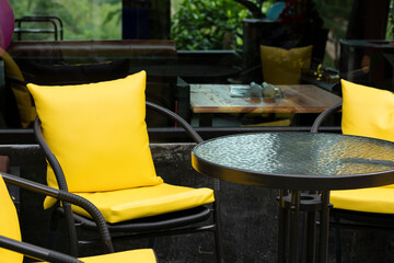 yellow chairs and tables