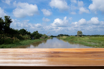 empty wooden table with the background is a landscape